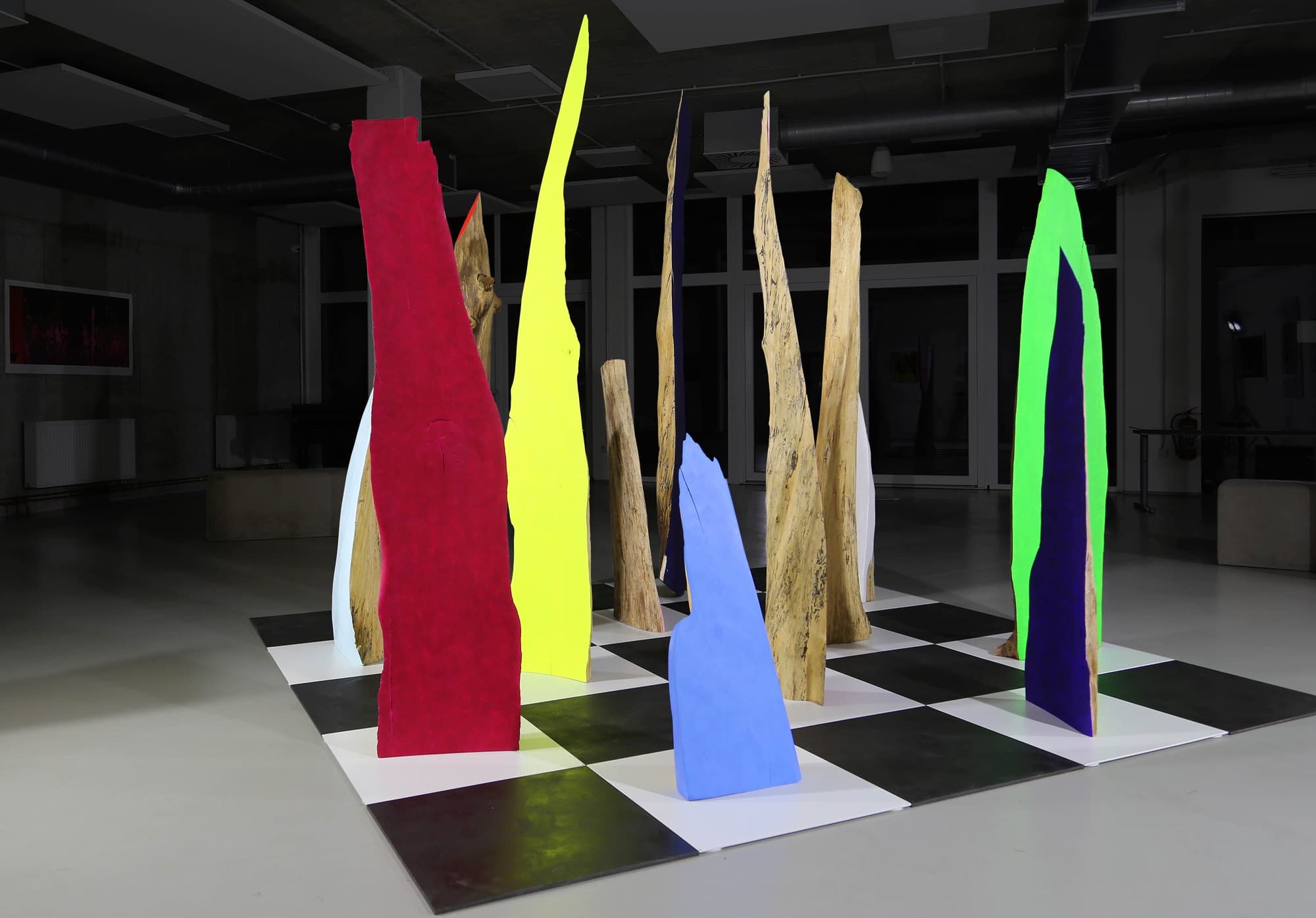 12, gallery installation view with red, yellow, blue and green forms